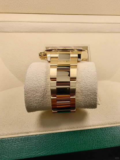 B – Rolex Cosmograph Daytona Yellow Gold Paul Newman Dial