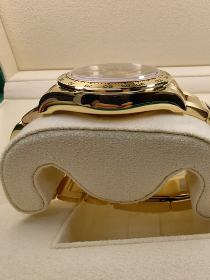 B – Rolex Cosmograph Daytona Yellow Gold Paul Newman Dial