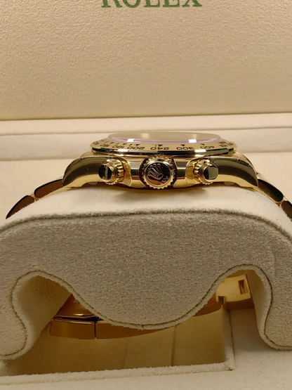 B – Rolex Cosmograph Daytona Yellow Gold Paul Newman Dial